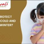 child suffering from cold and cough in winter